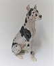 Bing & Grøndahl. Porcelænsfigur. Siddende Grand Danois. Model 2038. Højde 25 cm. 
(2 sortering)