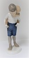 Bing & Grøndahl. Porcelænsfigur. Lege kammerater. Model 1848. Højde 19,5 cm. (1 
sortering)